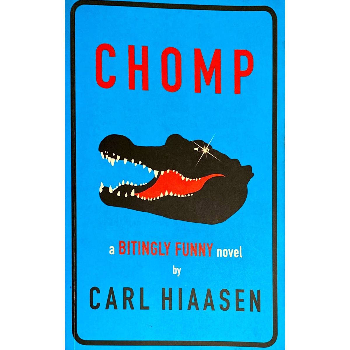 Chomp Poems Chomp: A Bitingly Funny Novel by Carl Hiaasen | Fact and Fiction
